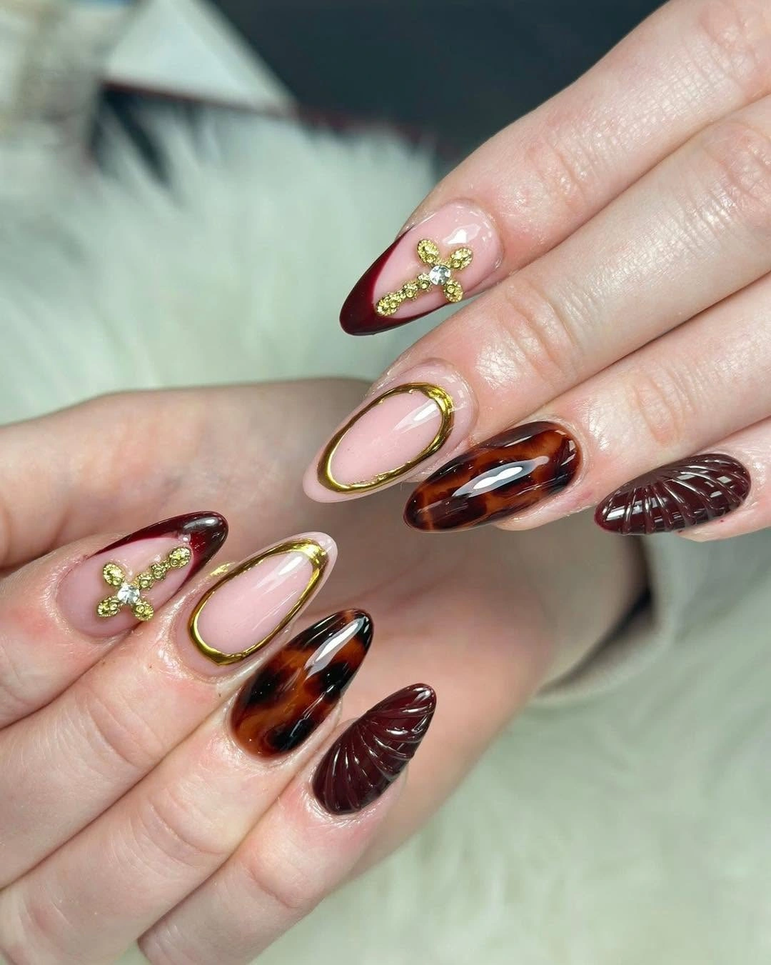 Long red square nails with white and silver snowflake accents