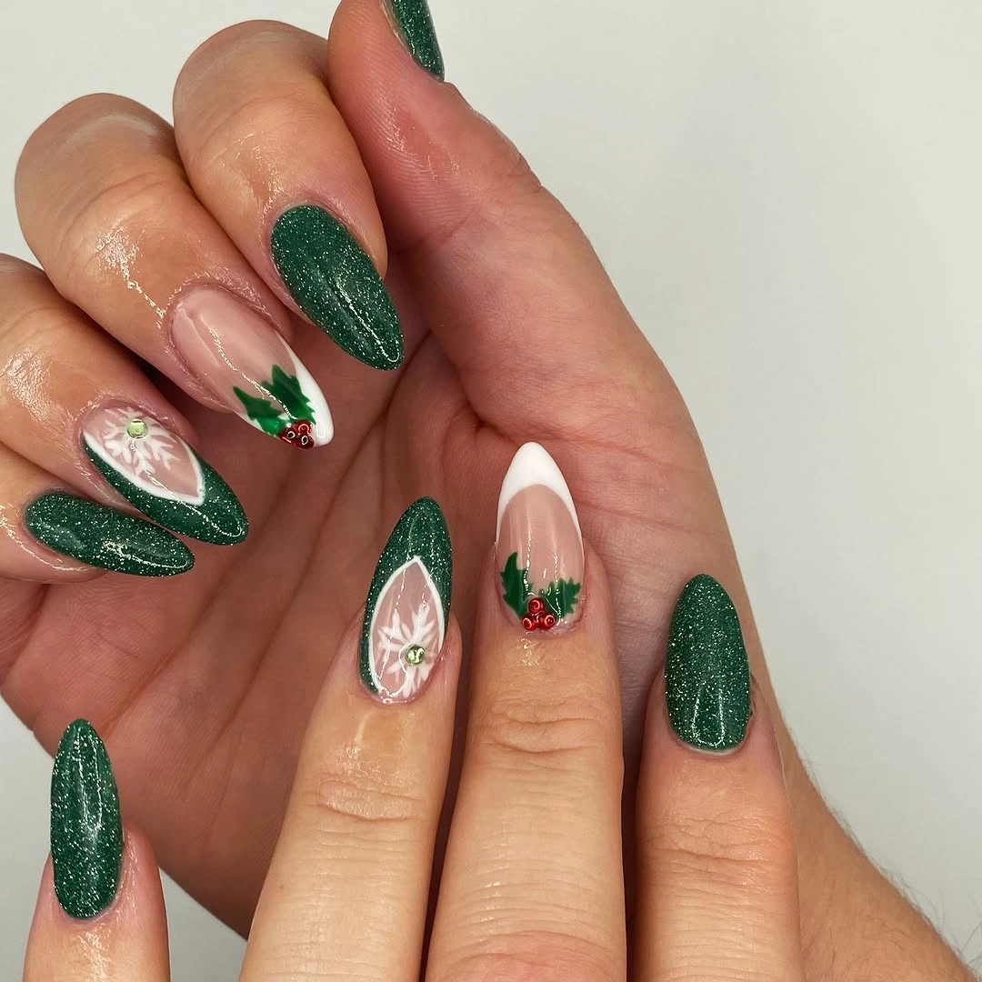Long navy nails with Santa, stars, gold swirls, and building motif