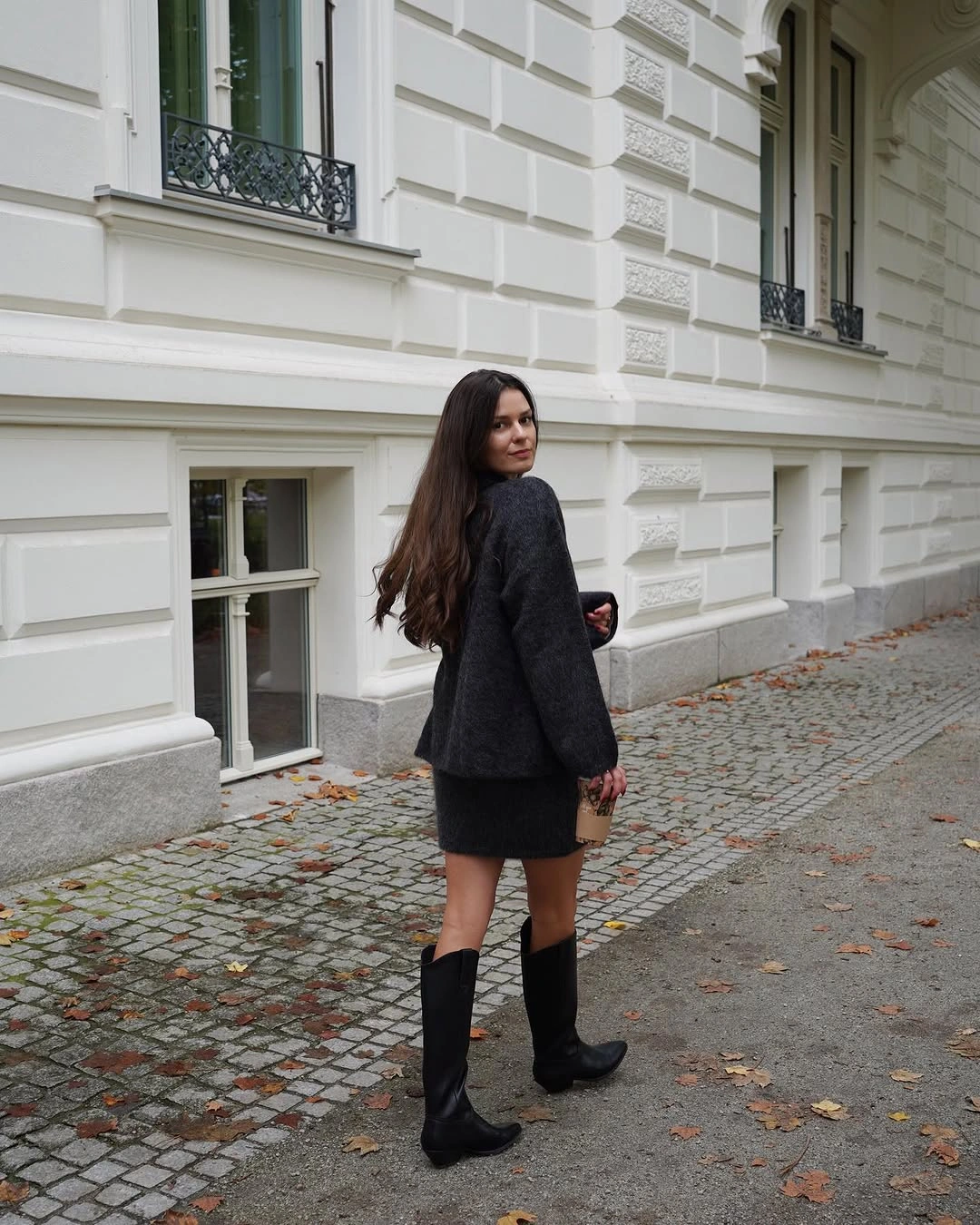 Dark gray jacket and matching skirt with tall black boots