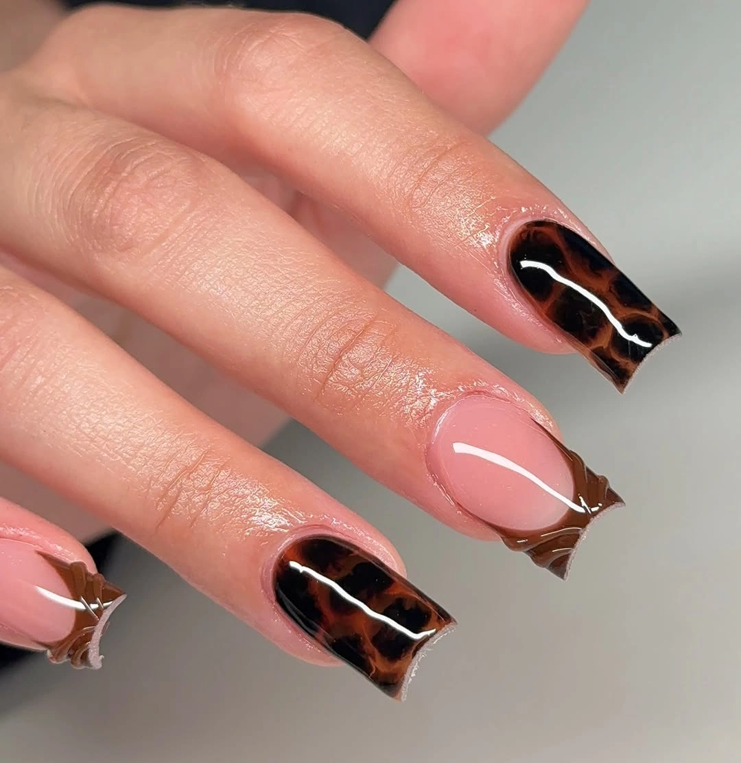 Long square nude nails with tortoiseshell-like brown tips