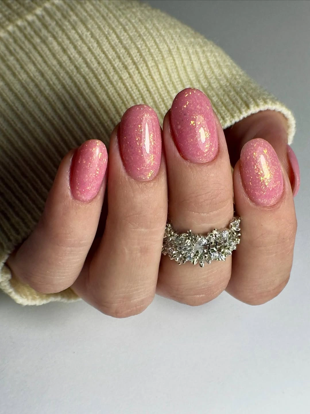 Oval gold nails with black and brown leopard-like spotted accents