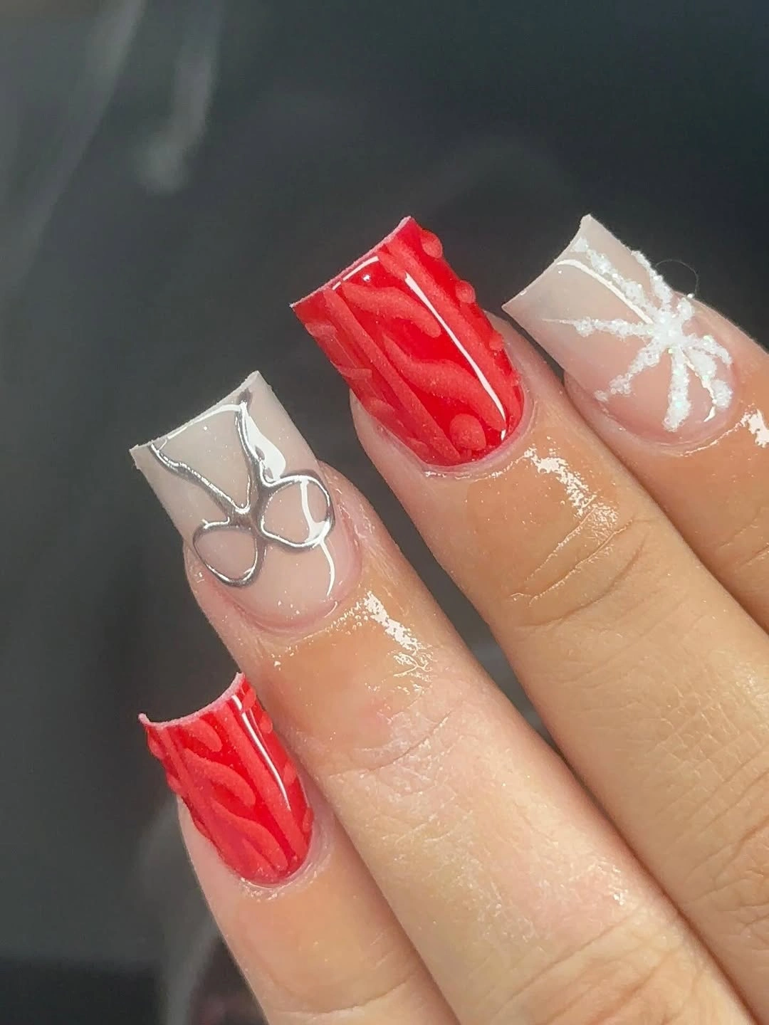 Medium-long almond nails in vivid glossy red