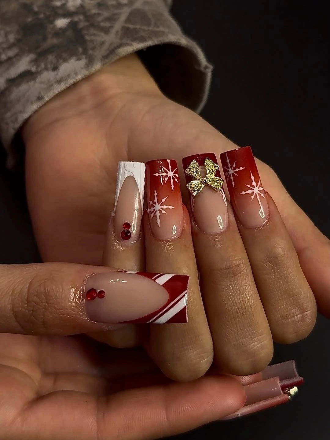 Almond red nails with stripes glitter and white details