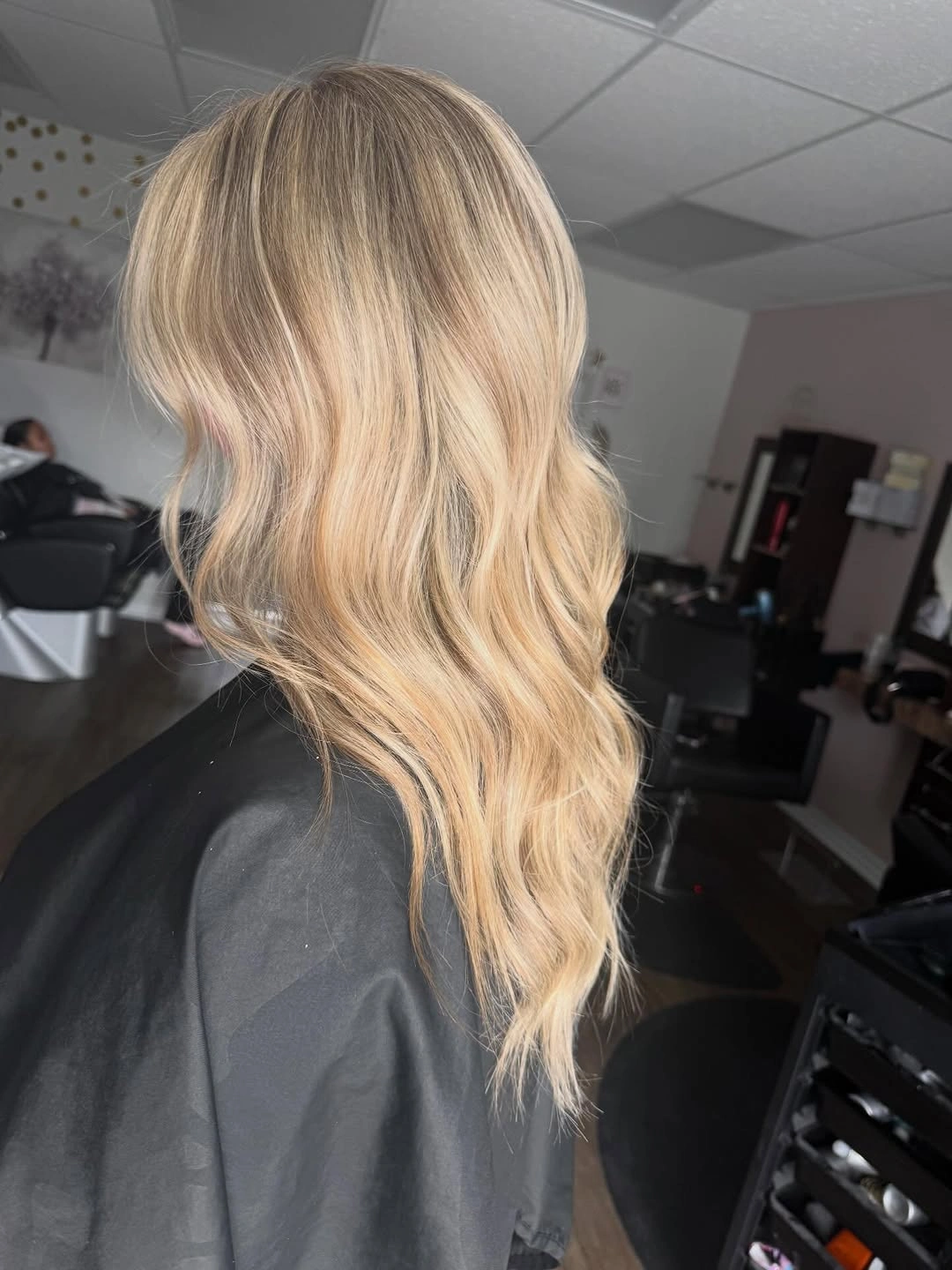 Medium beige blonde waves with deeper crown and lighter curled ends