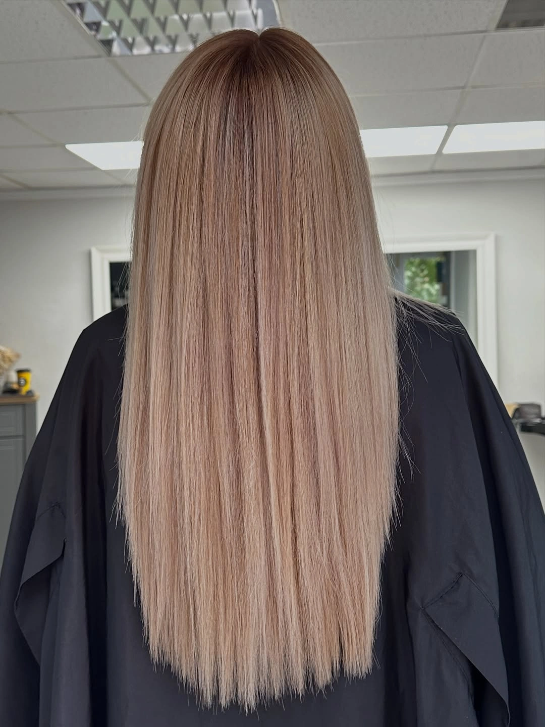 Long straight rose beige blonde hair with blunt smooth ends