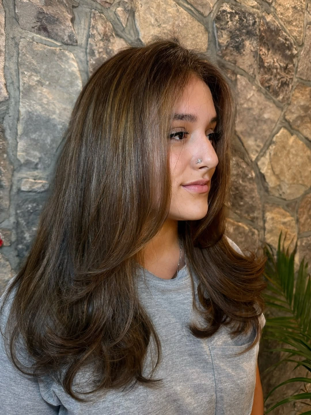 Warm brunette layered hair with golden-brown shine