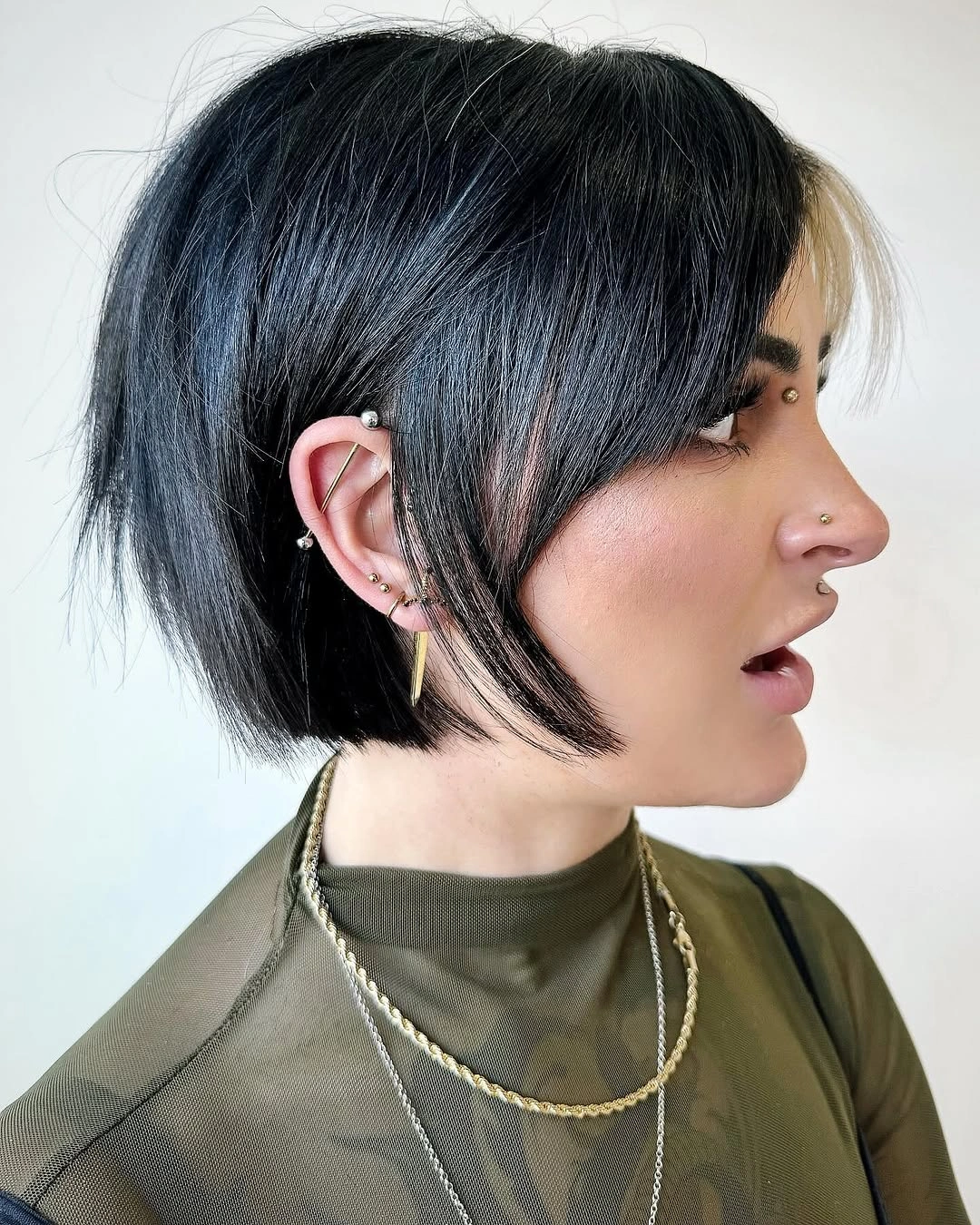 Short dark textured bob with longer pale front section