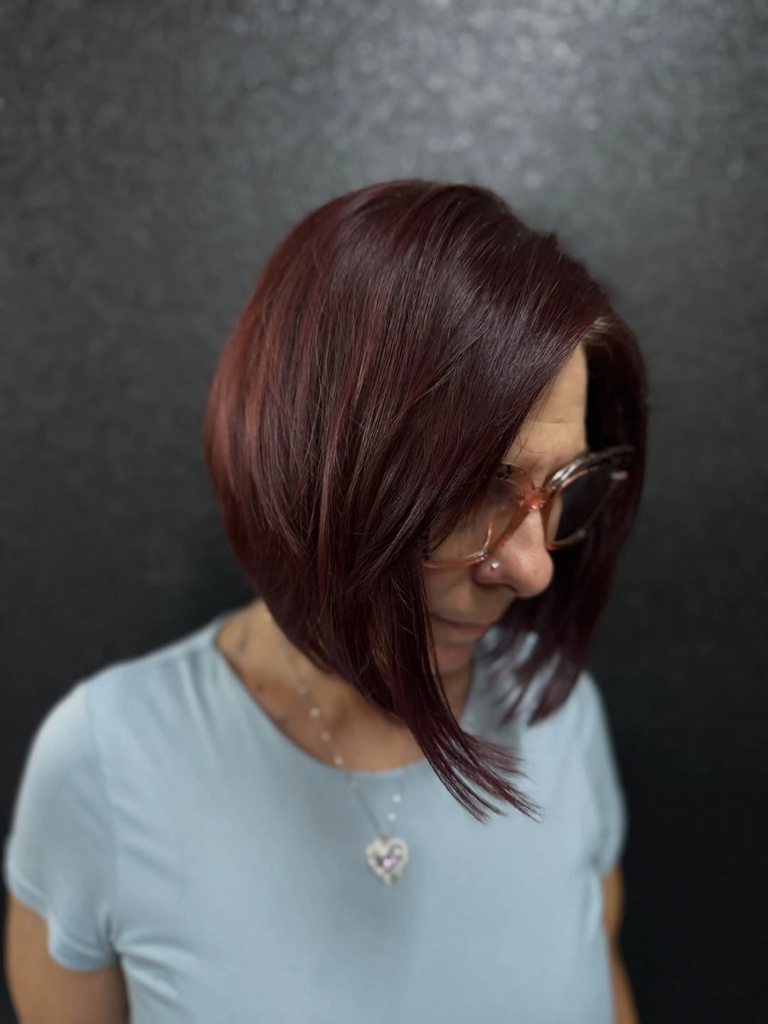 Burgundy angled bob with rounded back and smooth front panel