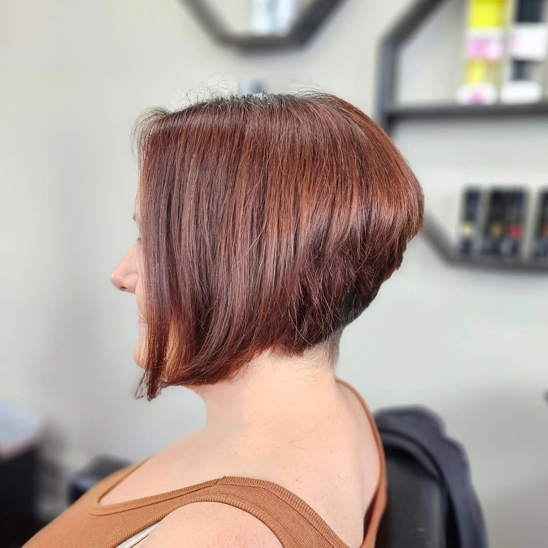 Copper short A-line bob with rounded stack and chin-level front