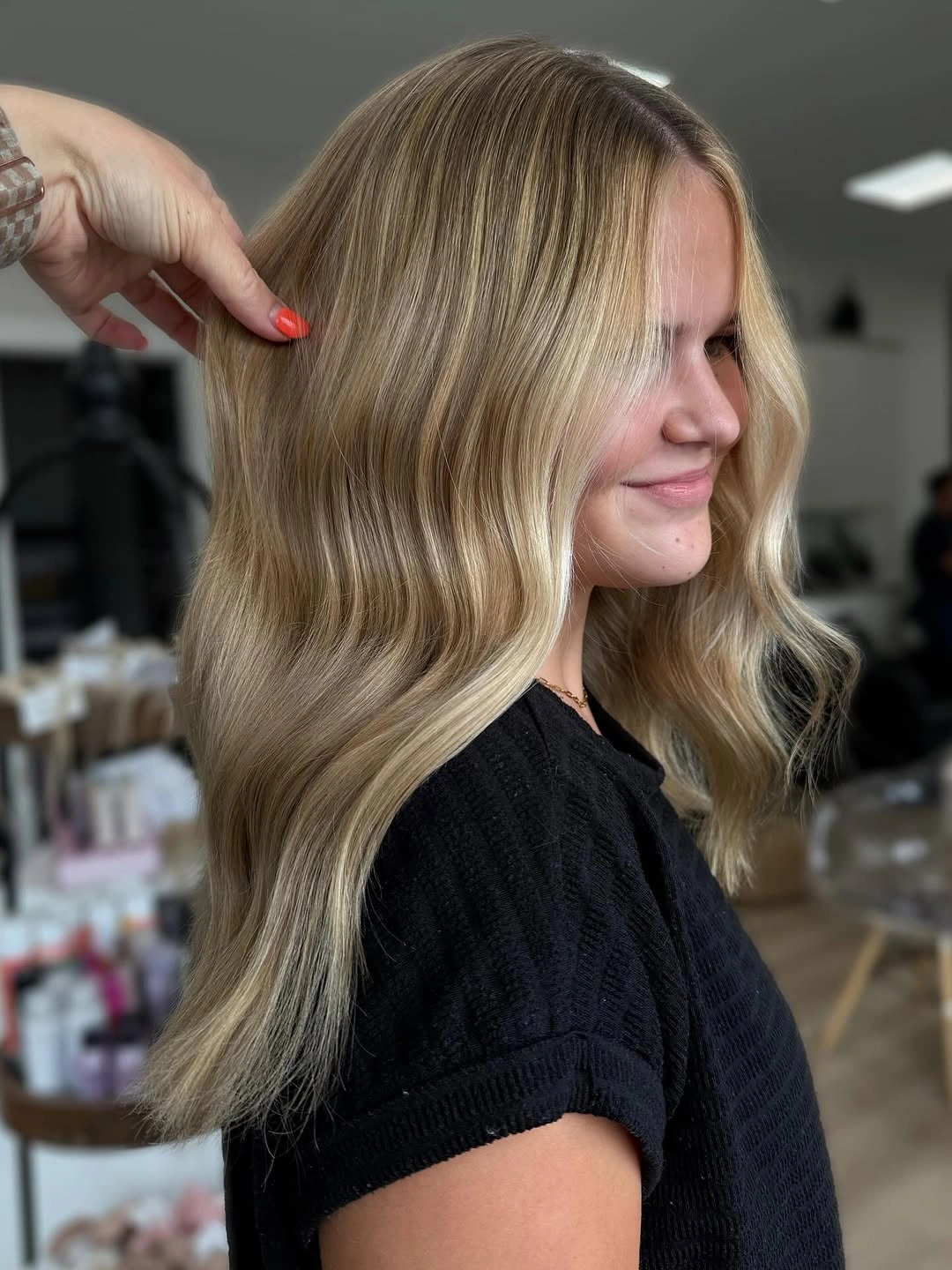 Side view of medium blonde waves with pale ends