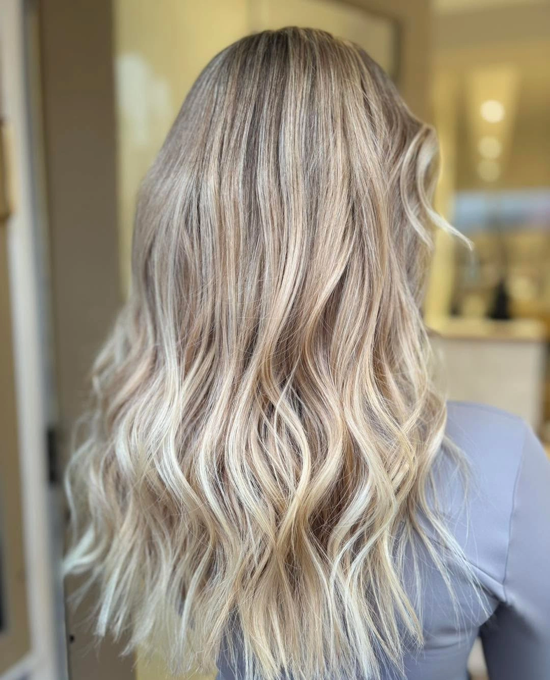 Back view of cool blonde waves with pale lower ribbons