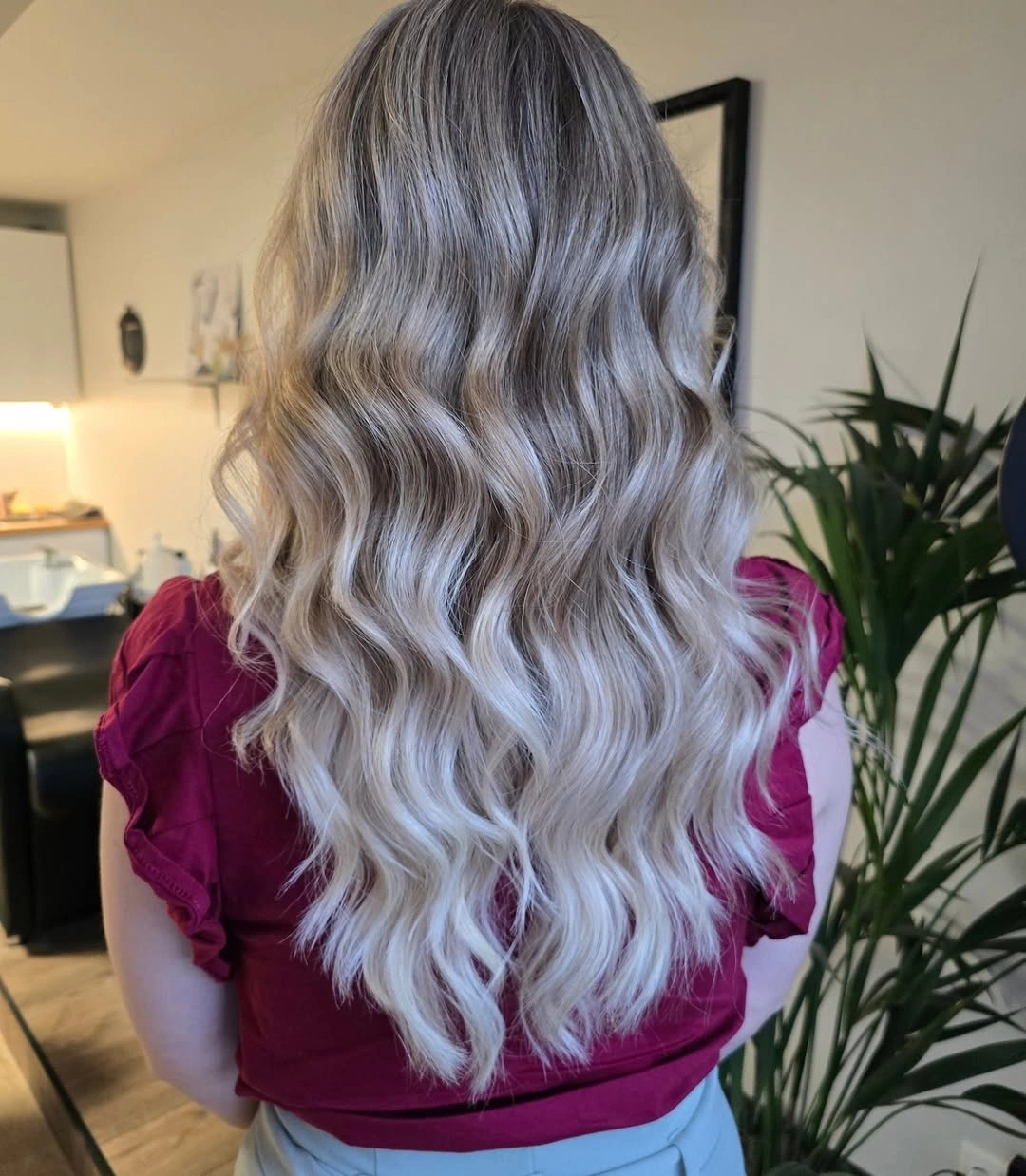 Smoky ash blonde waves with silver pale lengths