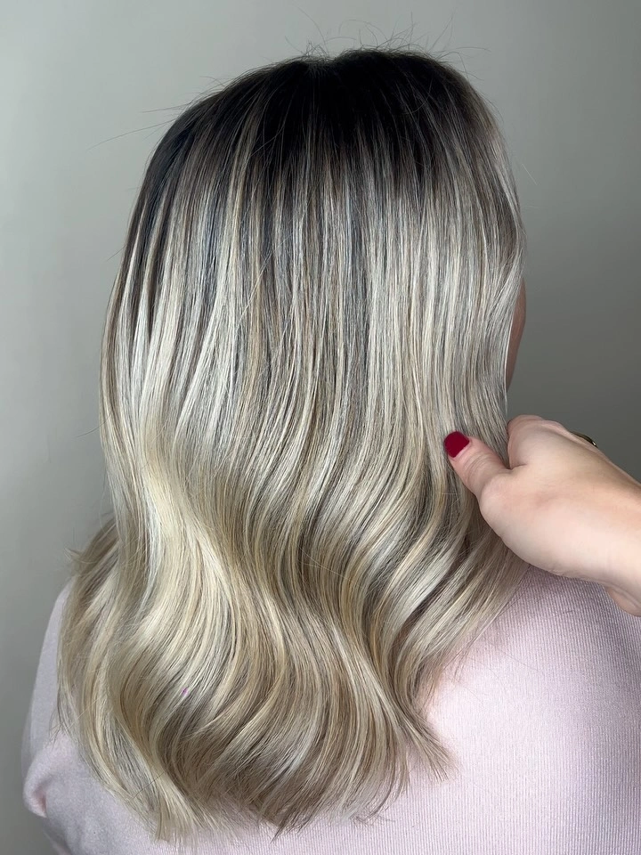 Long light hair with broad waves and full ends