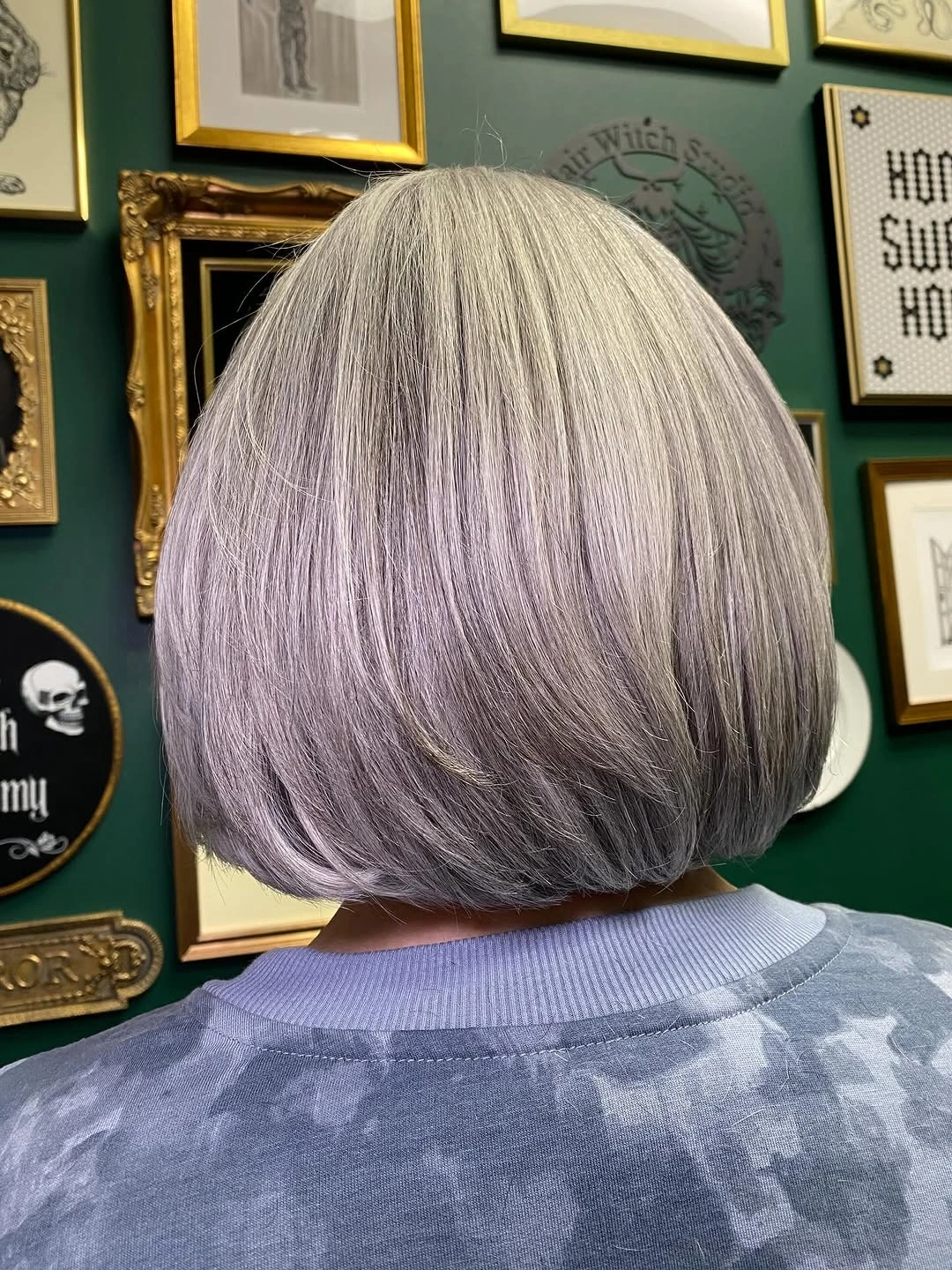 Short rounded bob with softly tucked nape-length ends