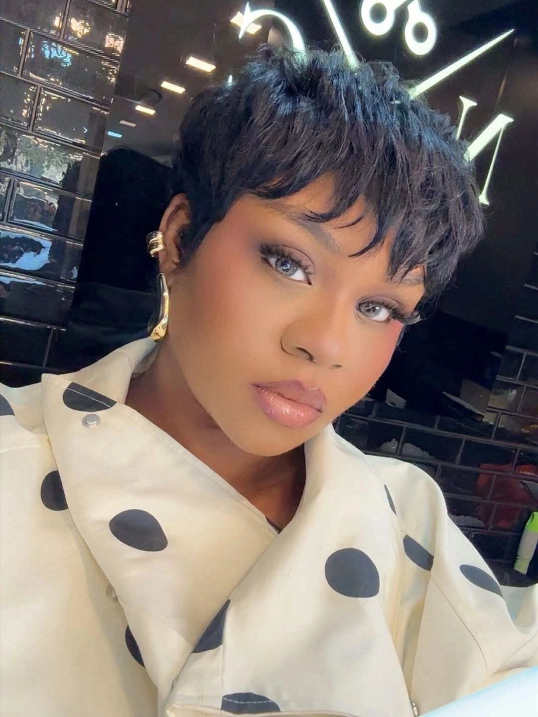 Short dark pixie with wispy fringe and textured top