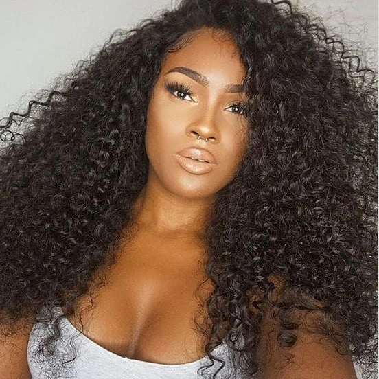 Long dark curls with an off-center opening and a wide, irregular outline
