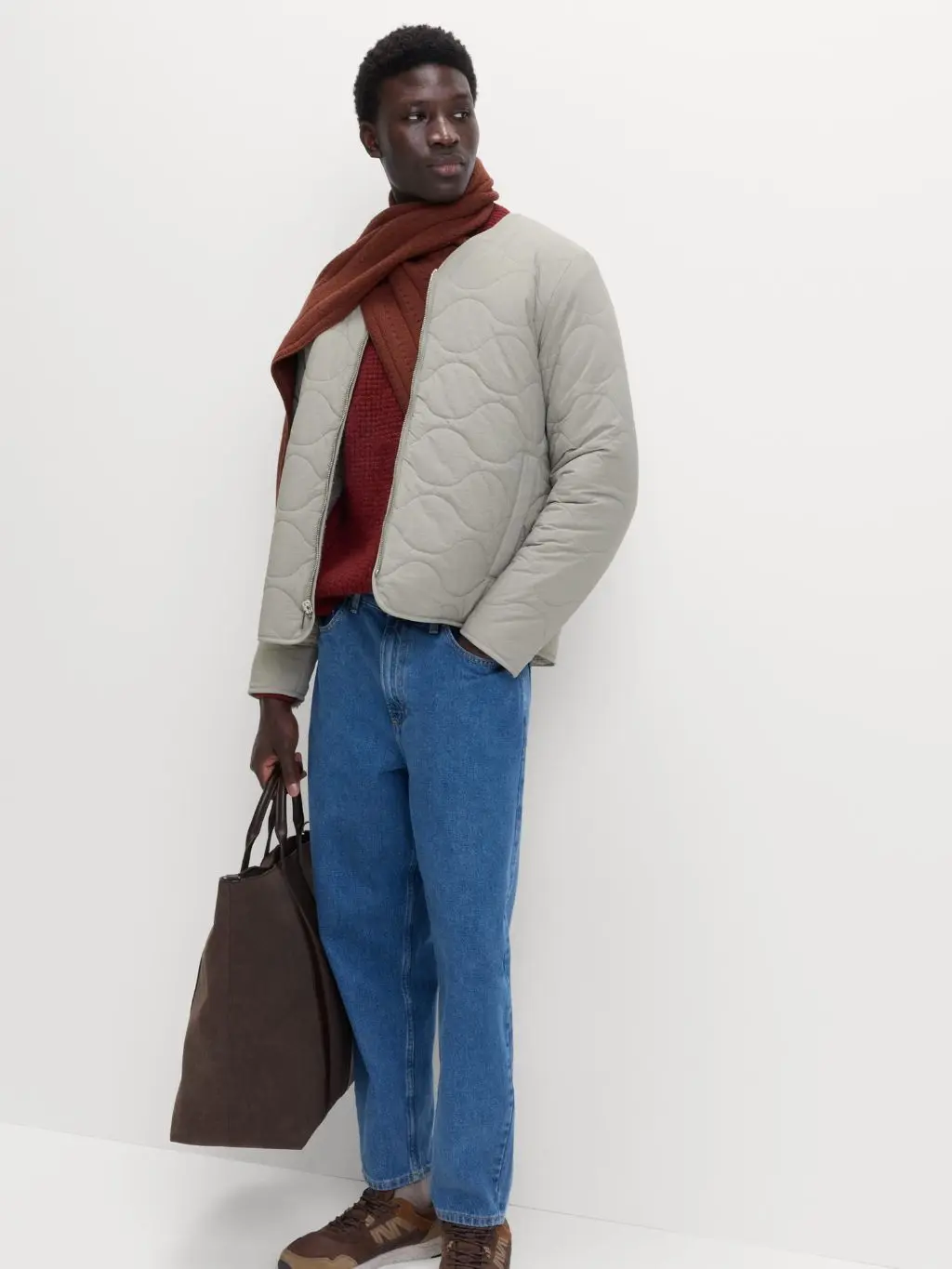 Layered Textures: Quilted Jacket with Rust Red Sweater Layered Textures: Quilted Jacket with Rust Red Sweater — Winter Outfits for Men