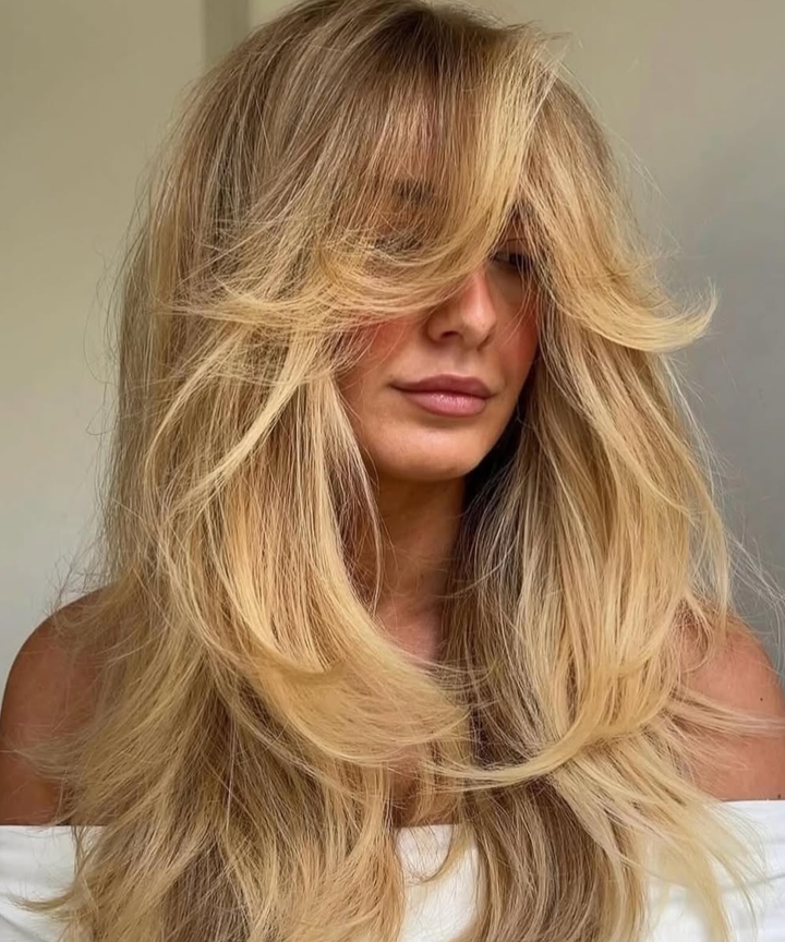 Voluminous Platinum Shag With Curtain Bangs Voluminous Platinum Shag With Curtain Bangs — Winter Haircuts with Bangs