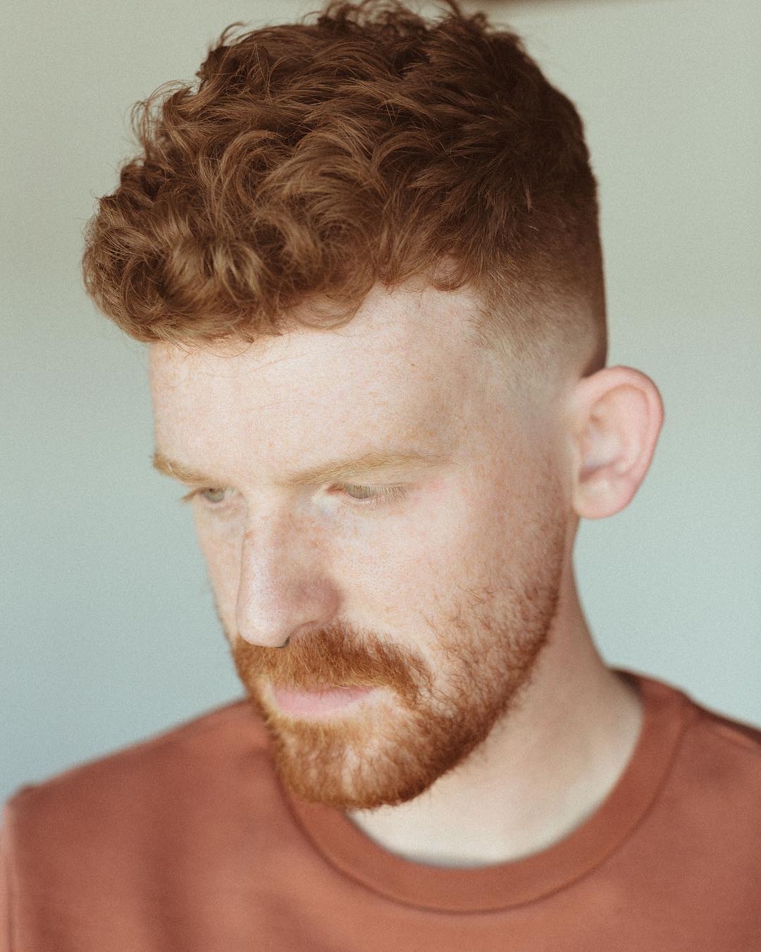 Short Textured Crop Red Curls — Winter Haircuts for Men