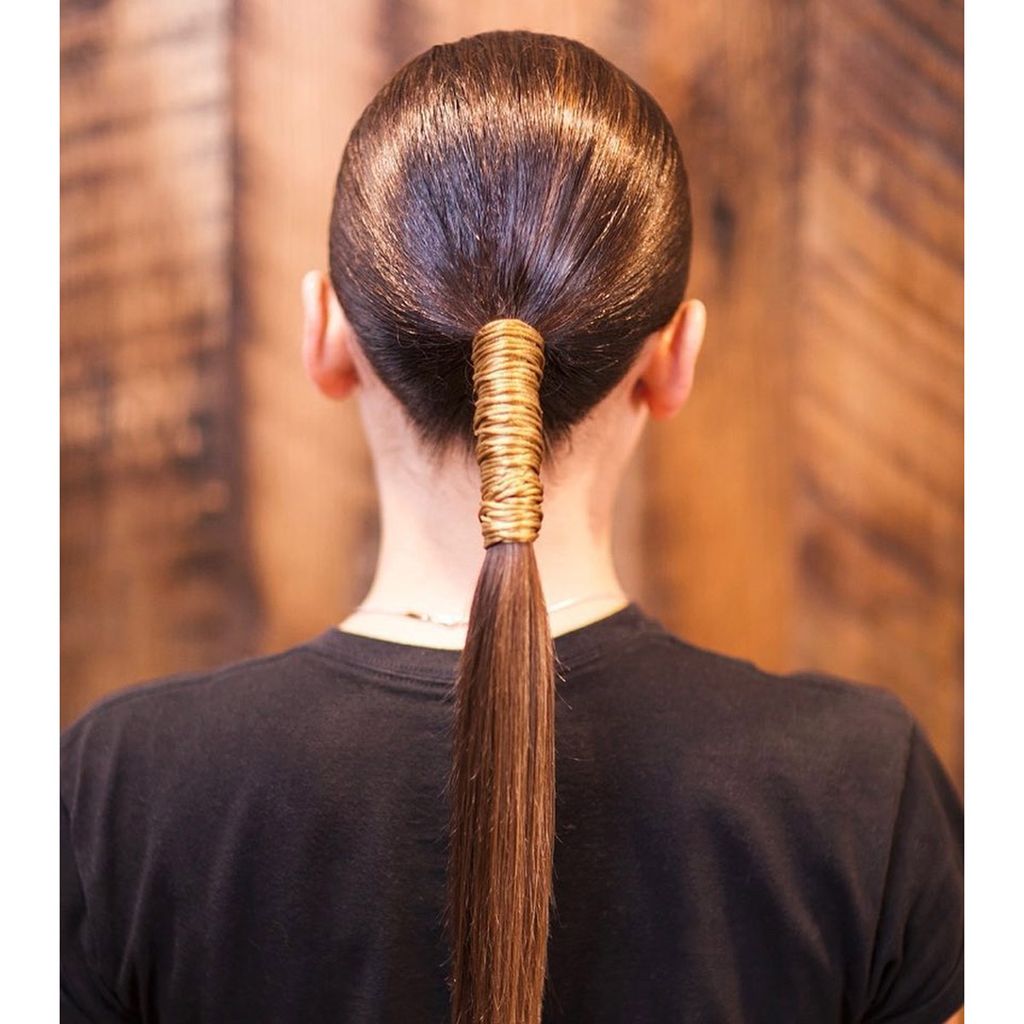 Sleek Dark Brown Ponytail with Gold Wrap Sleek Dark Brown Ponytail with Gold Wrap — Winter Ponytail Hairstyles