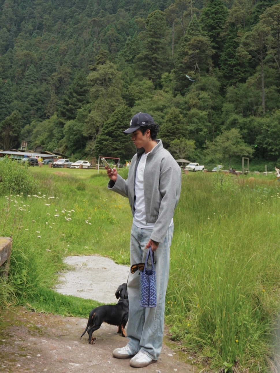 Layered gray casual outfit with white T-shirt and loose trousers
