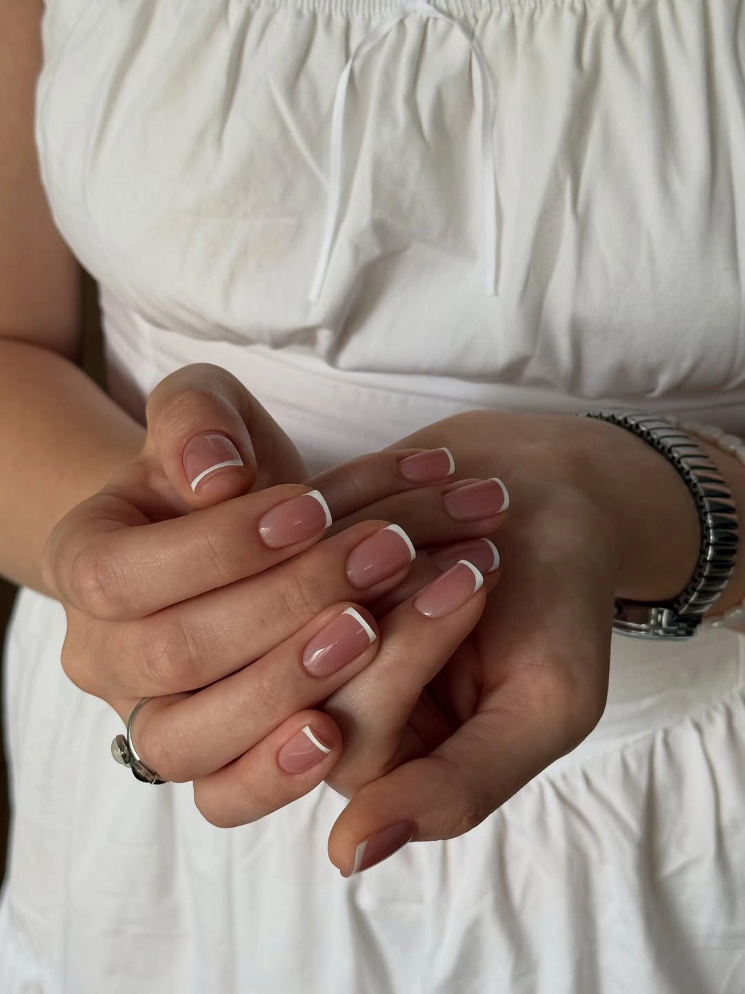 Squoval French manicure with nude pink base