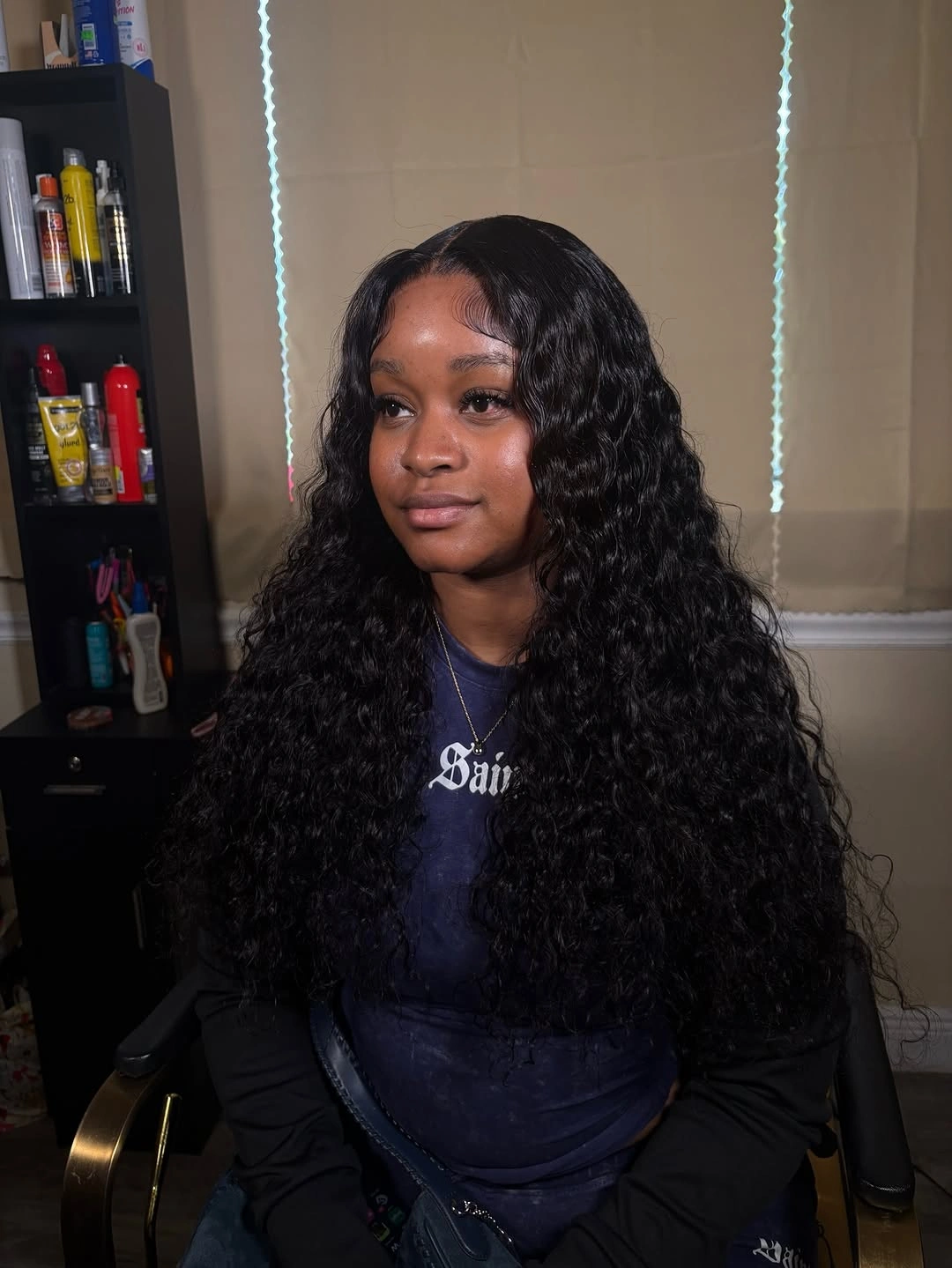 Long dark curls with center part and full sides