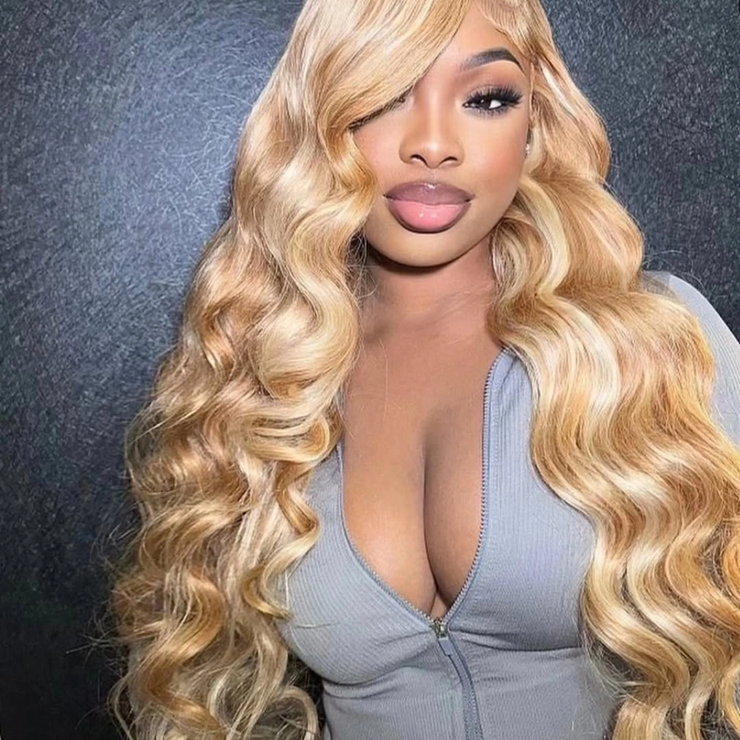 Long blonde loose waves with side-swept front