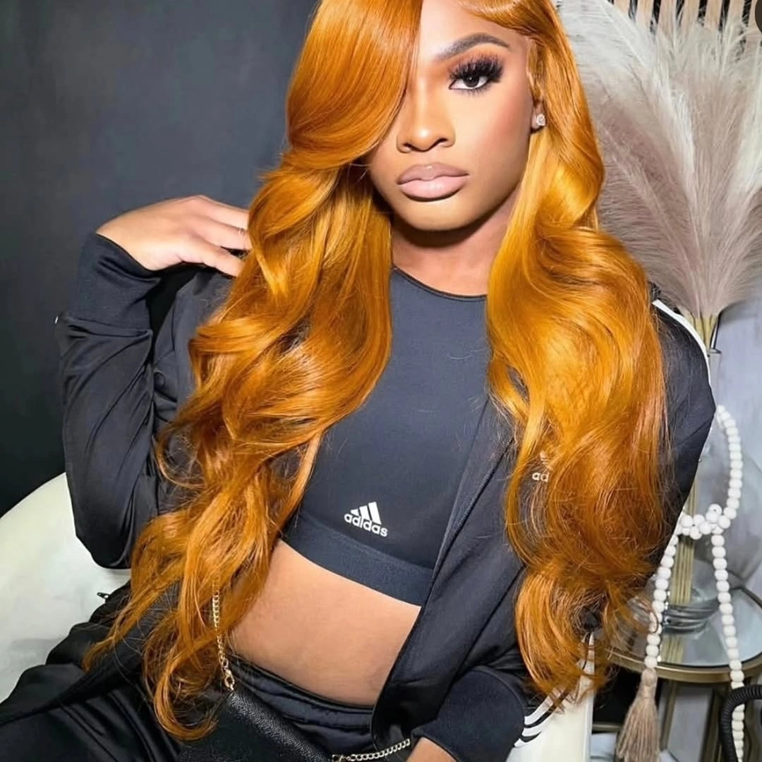Long copper-orange waves with side part and volume