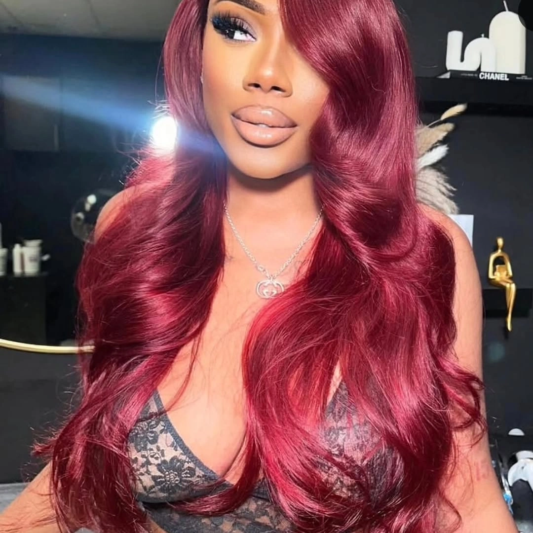 Long burgundy red waves with deep side part