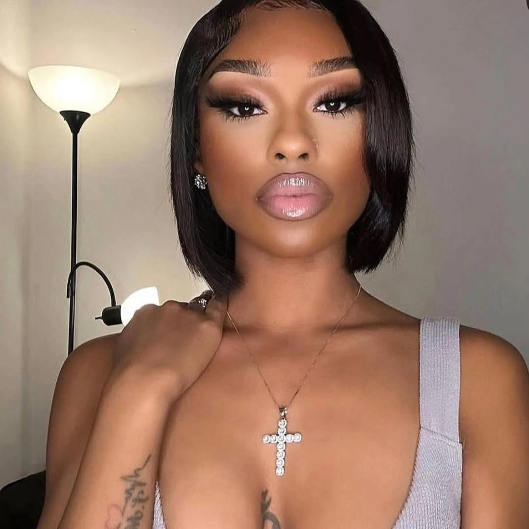 Short sleek black bob with clean center part