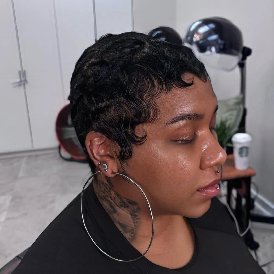 Short dark waved crop with curved forehead pieces
