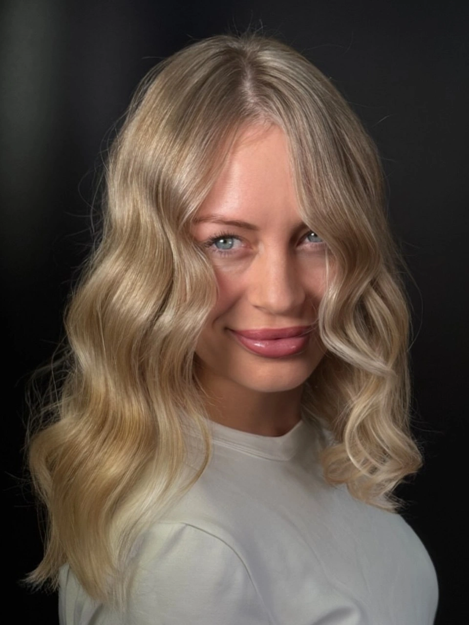 Dark blunt bob from back with compact rounded sides
