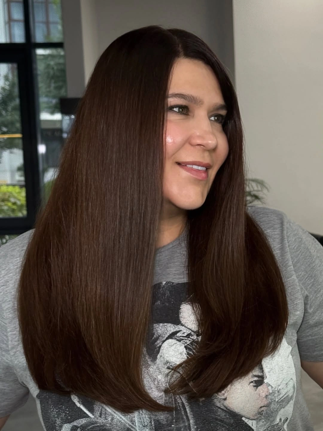 Short brown stacked-looking bob with clean exposed nape