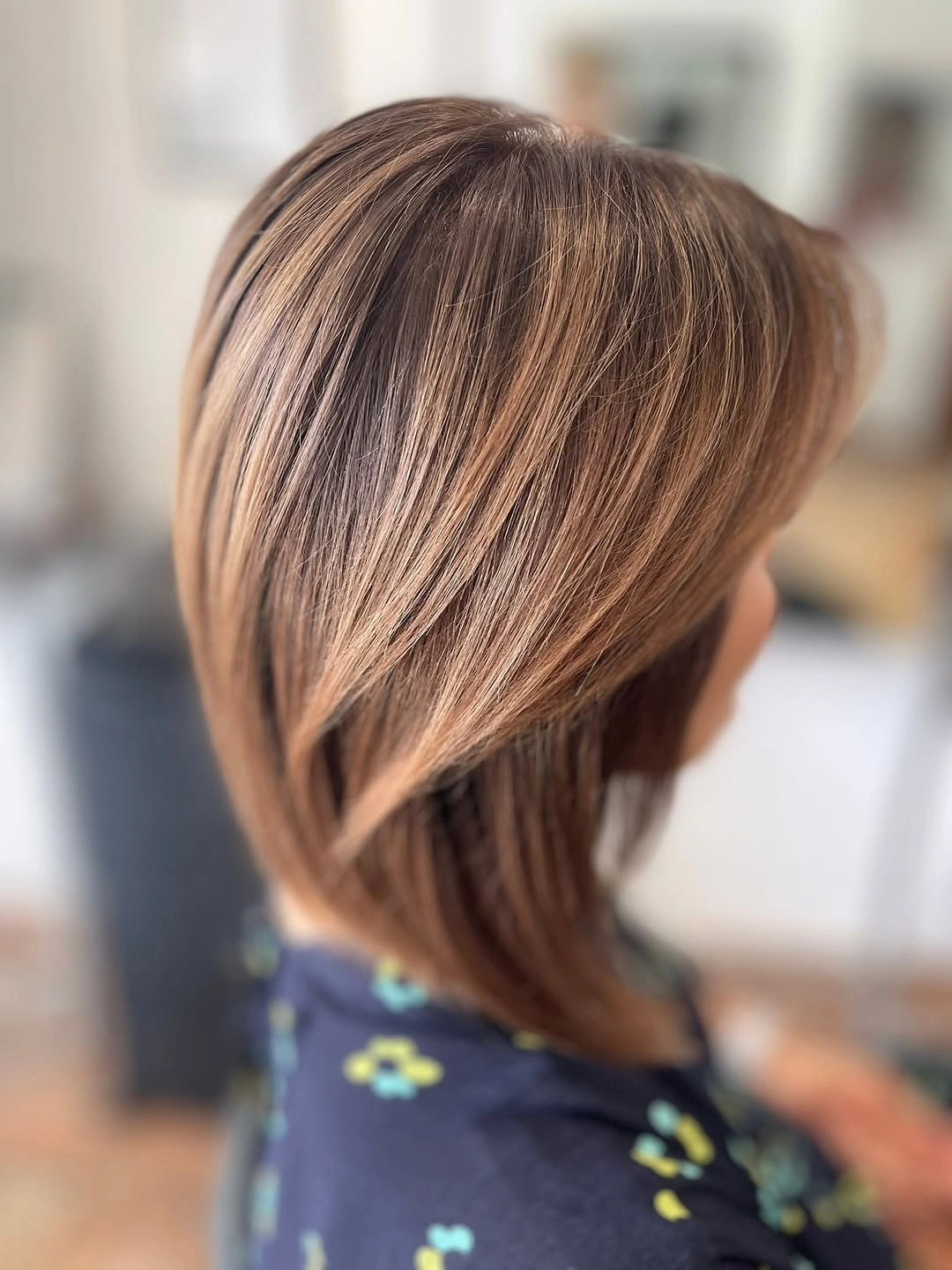 Pale blonde shoulder-grazing long bob with even edge