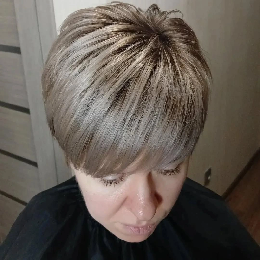 Top view of silver pixie with sweeping bangs