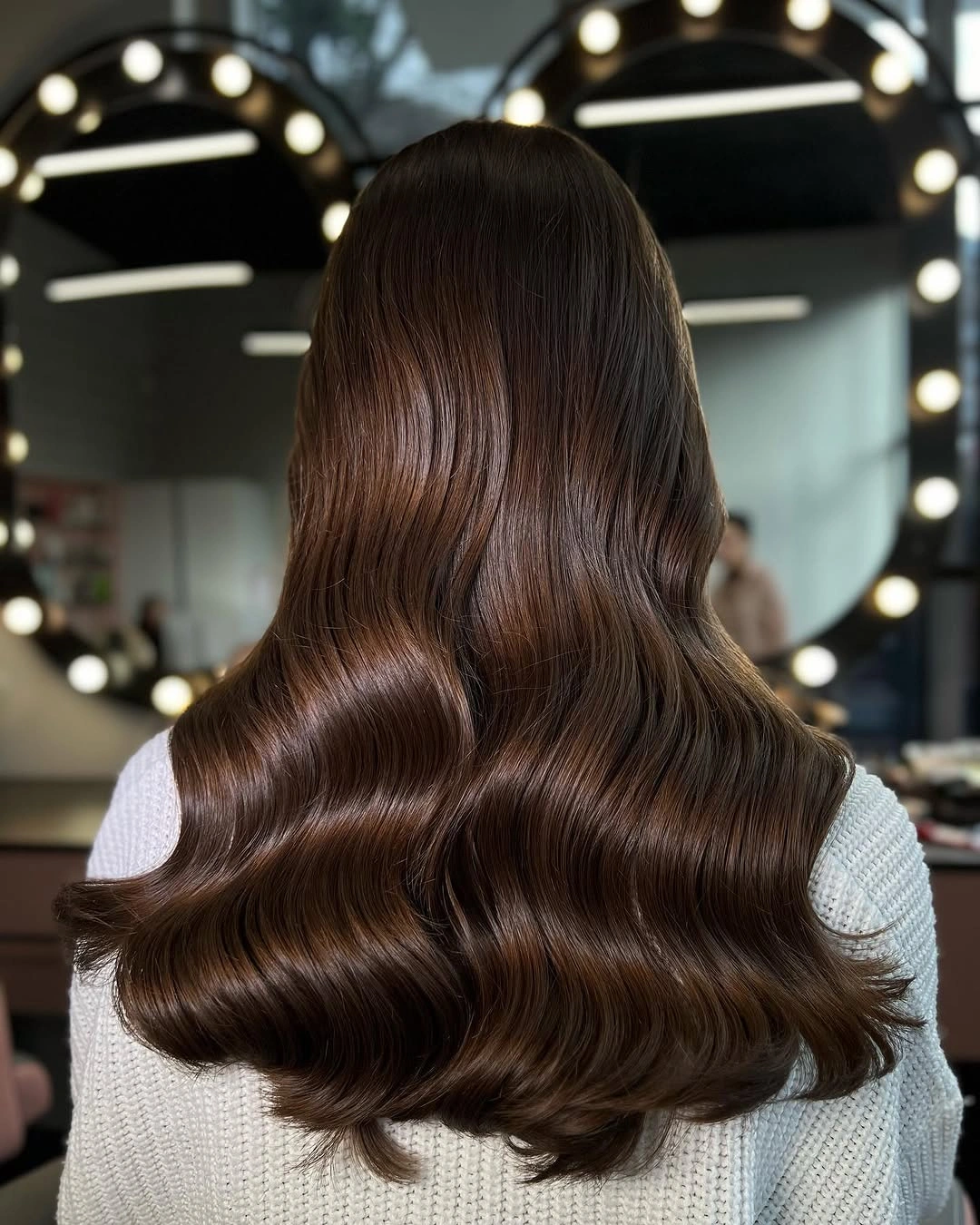 Long glossy brunette waves from the back