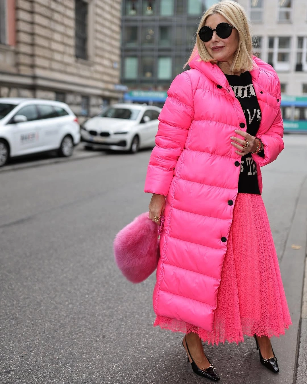Bright pink long puffer with skirt and fluffy bag