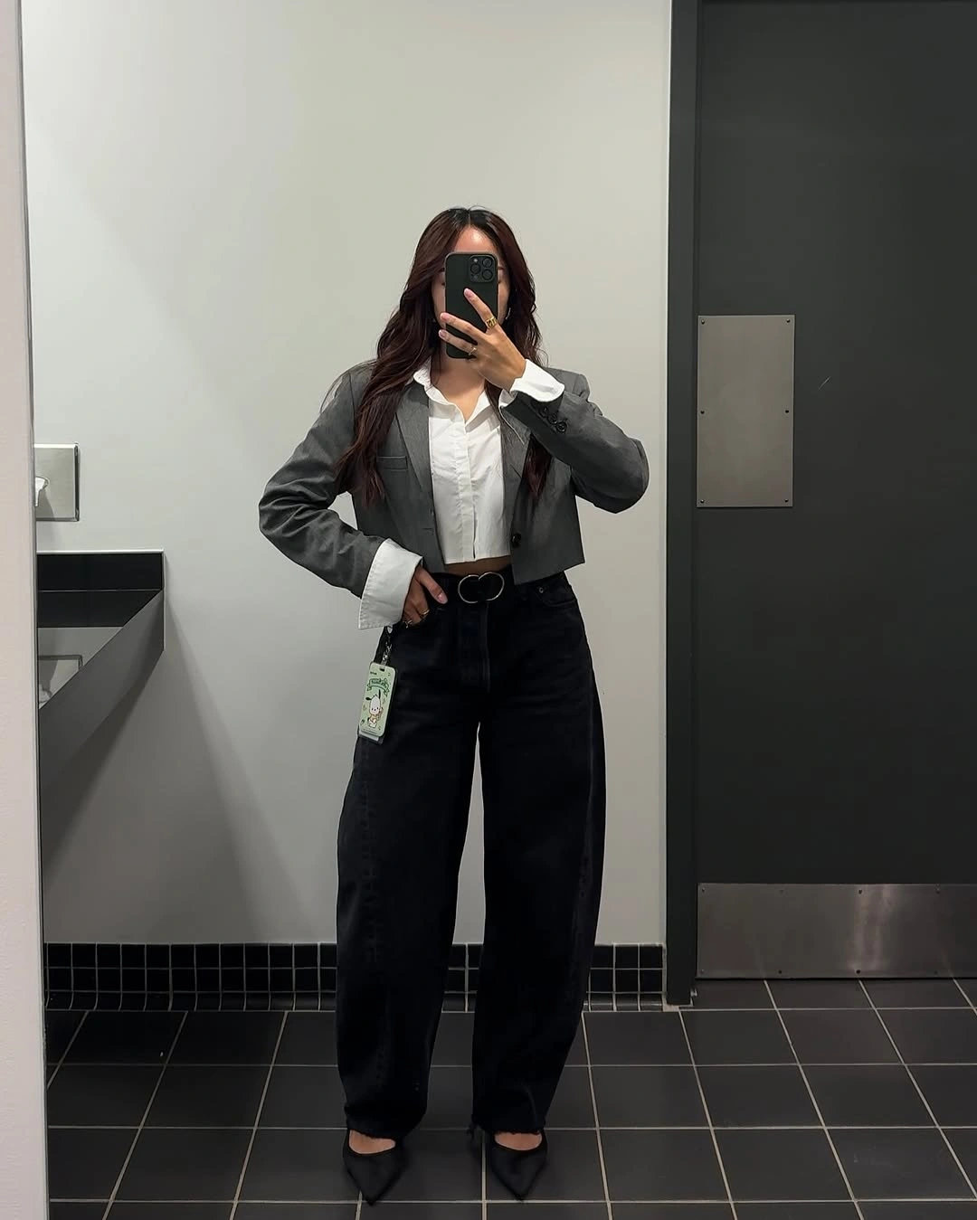 Cropped gray jacket white shirt and black wide trousers