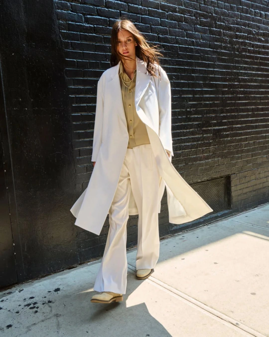 White blazer tan blouse and white wide trousers