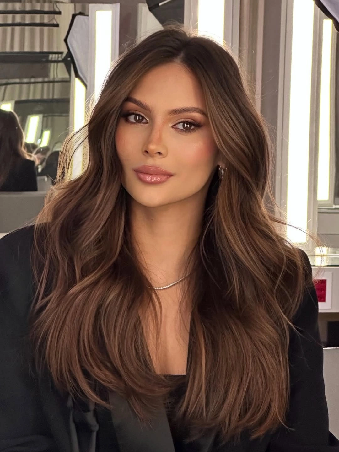 Long cool medium-brown waves with subtle lighter lengths