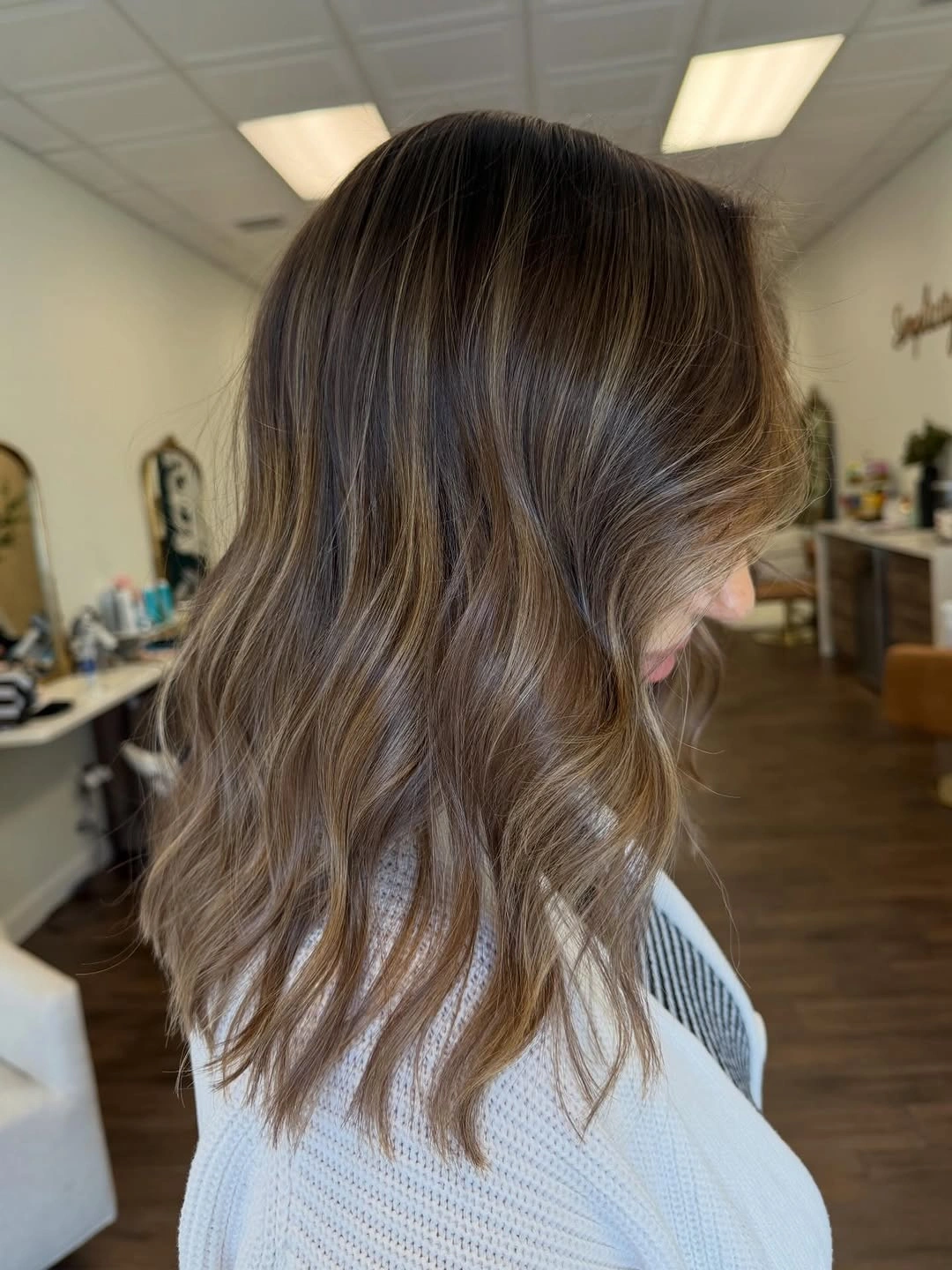 Medium ash brown waves with subtle beige threads