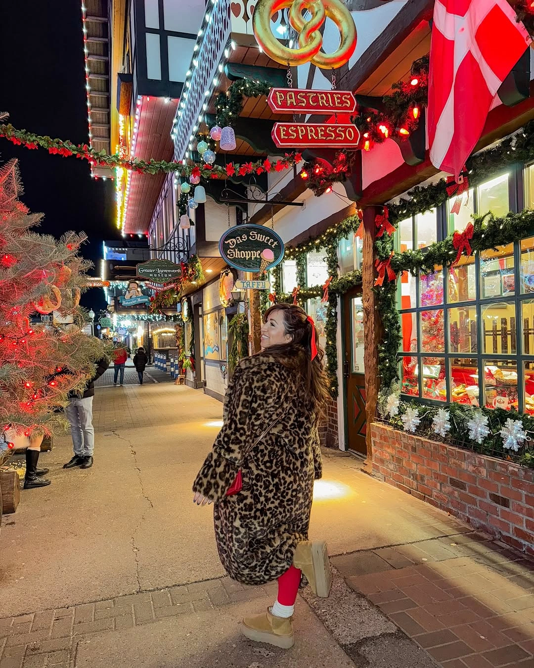 Leopard-print long coat with pink leggings and tan platform boots