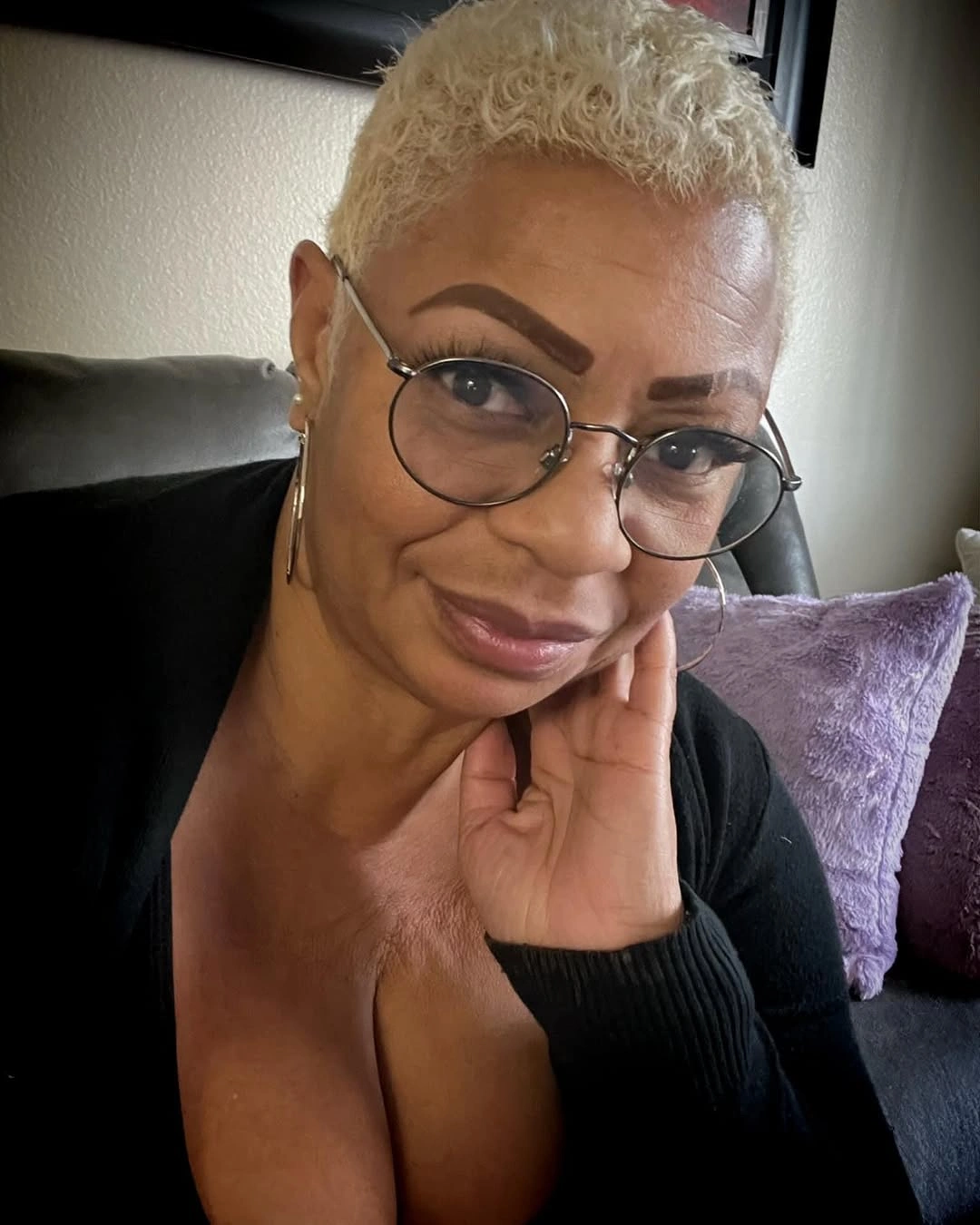 Very short pale creamy blonde crop with tiny curls