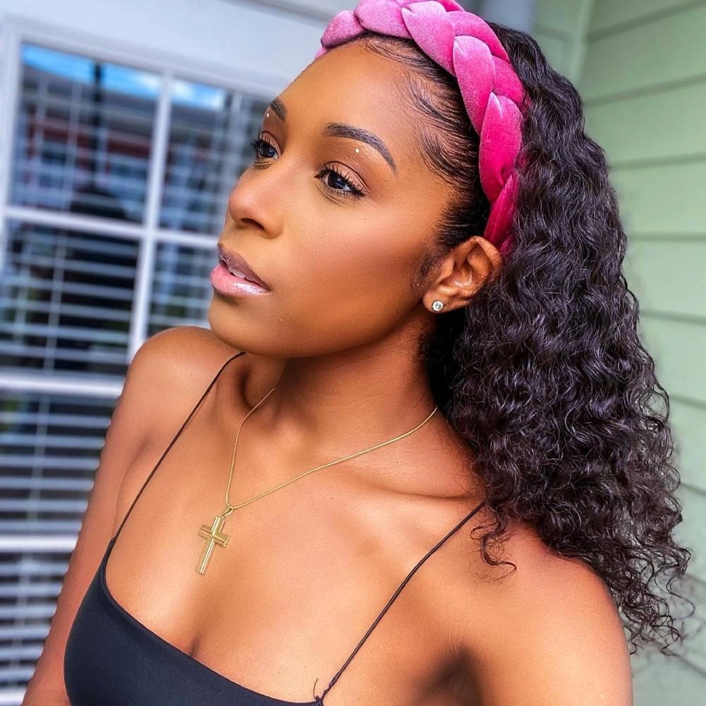 Long dark curls with pink braided headband-like crown accent