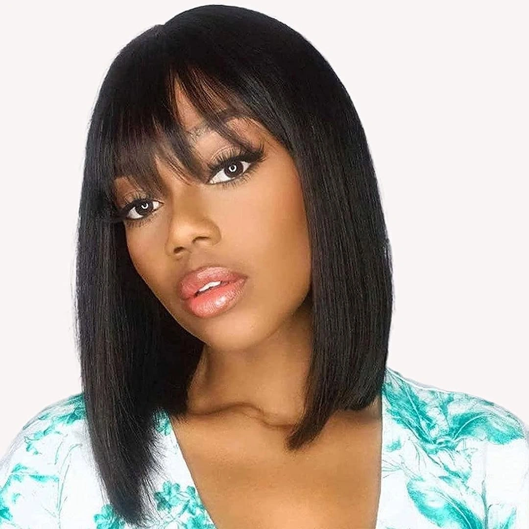 Sleek near-black bob with full fringe and shoulder-level perimeter