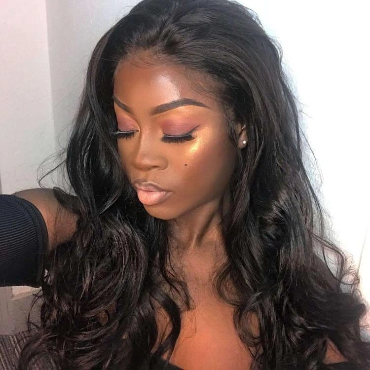 Long deep brown-black hair with broad loose waves