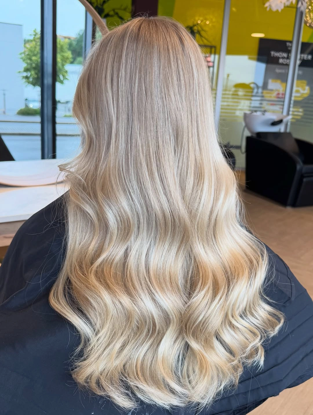 Long creamy blonde waves with soft vanilla beige ribbons