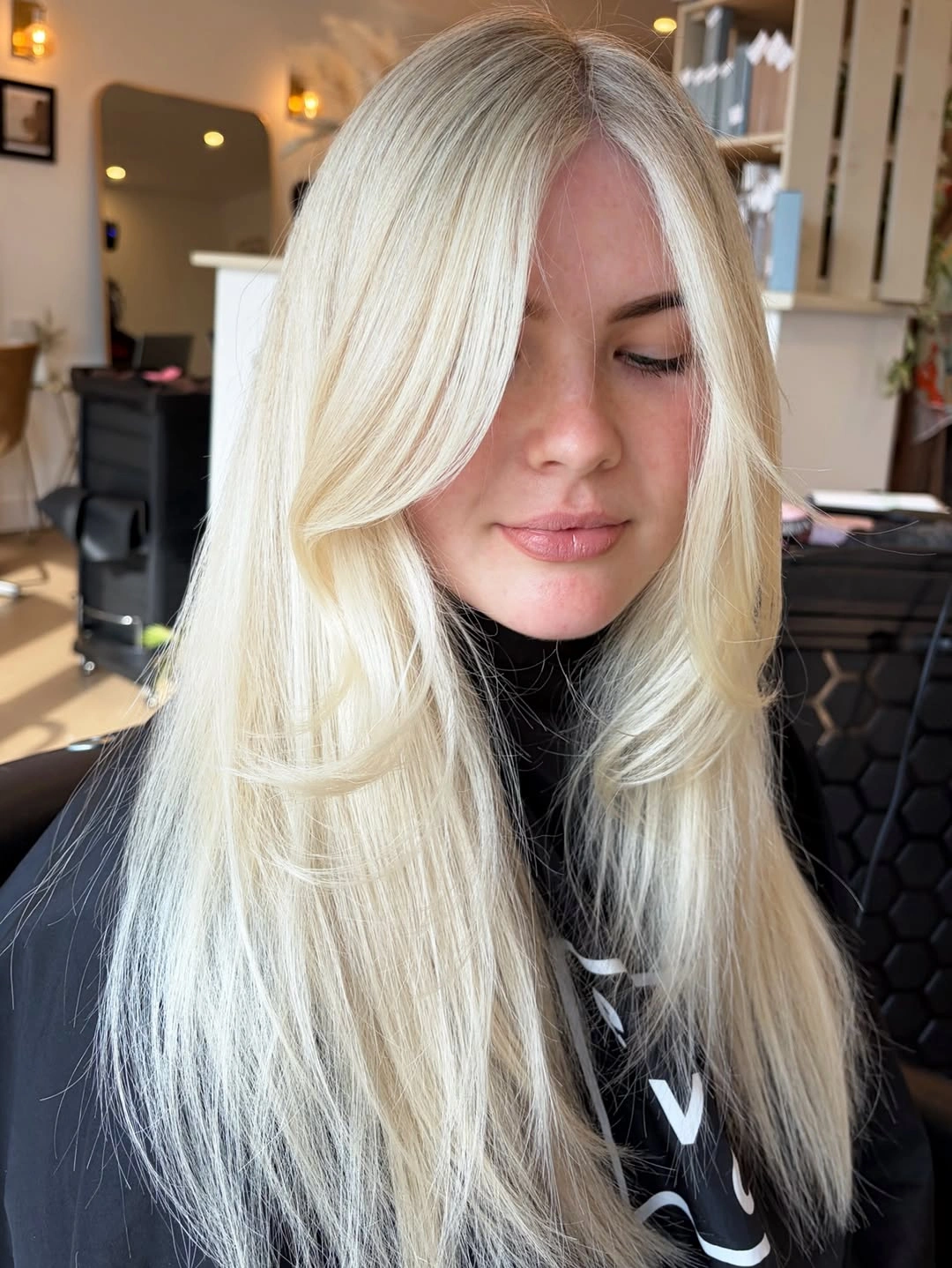 Long ivory platinum blonde hair with sweeping front layer