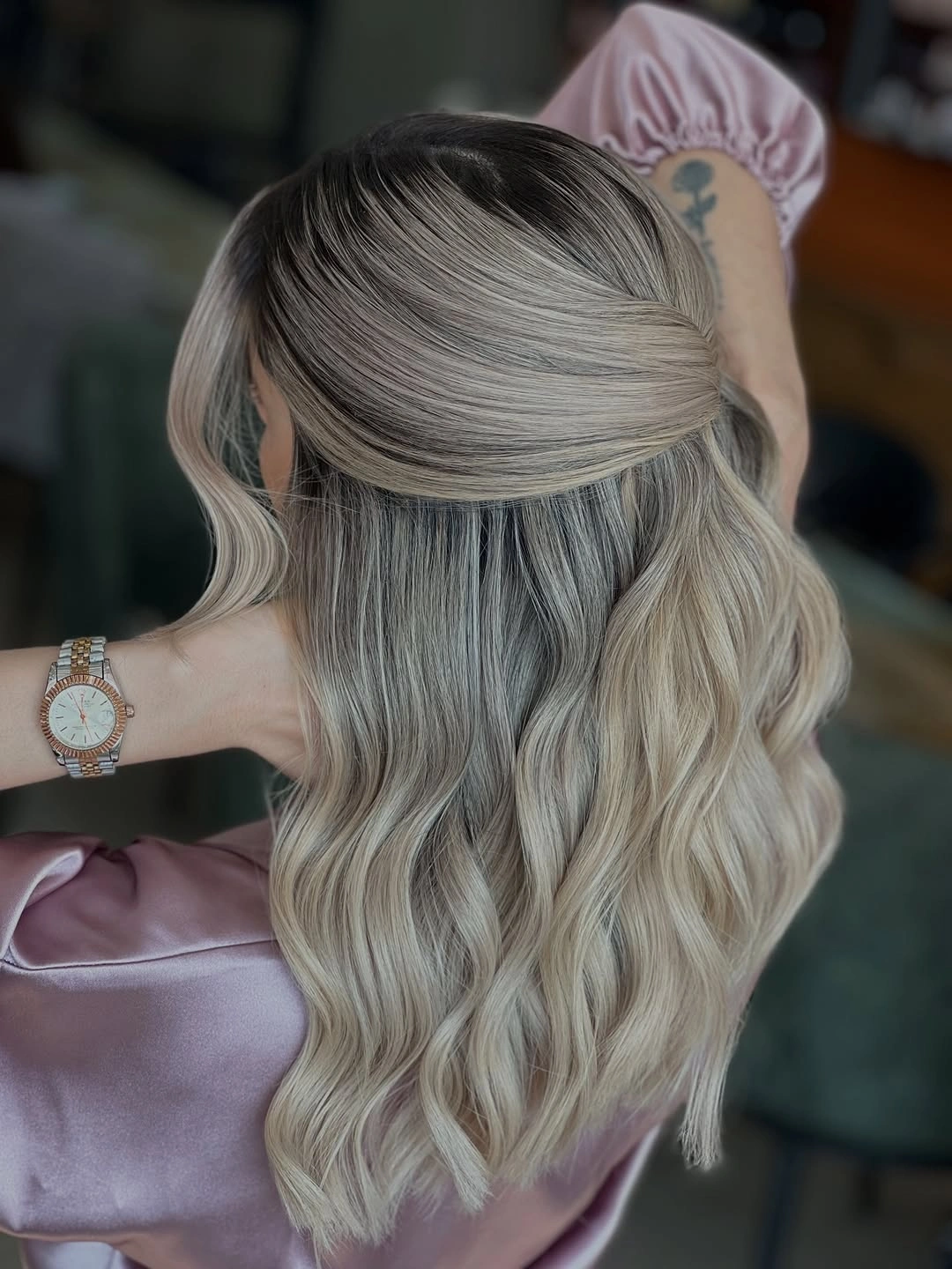Half up cool beige blonde waves with darker root
